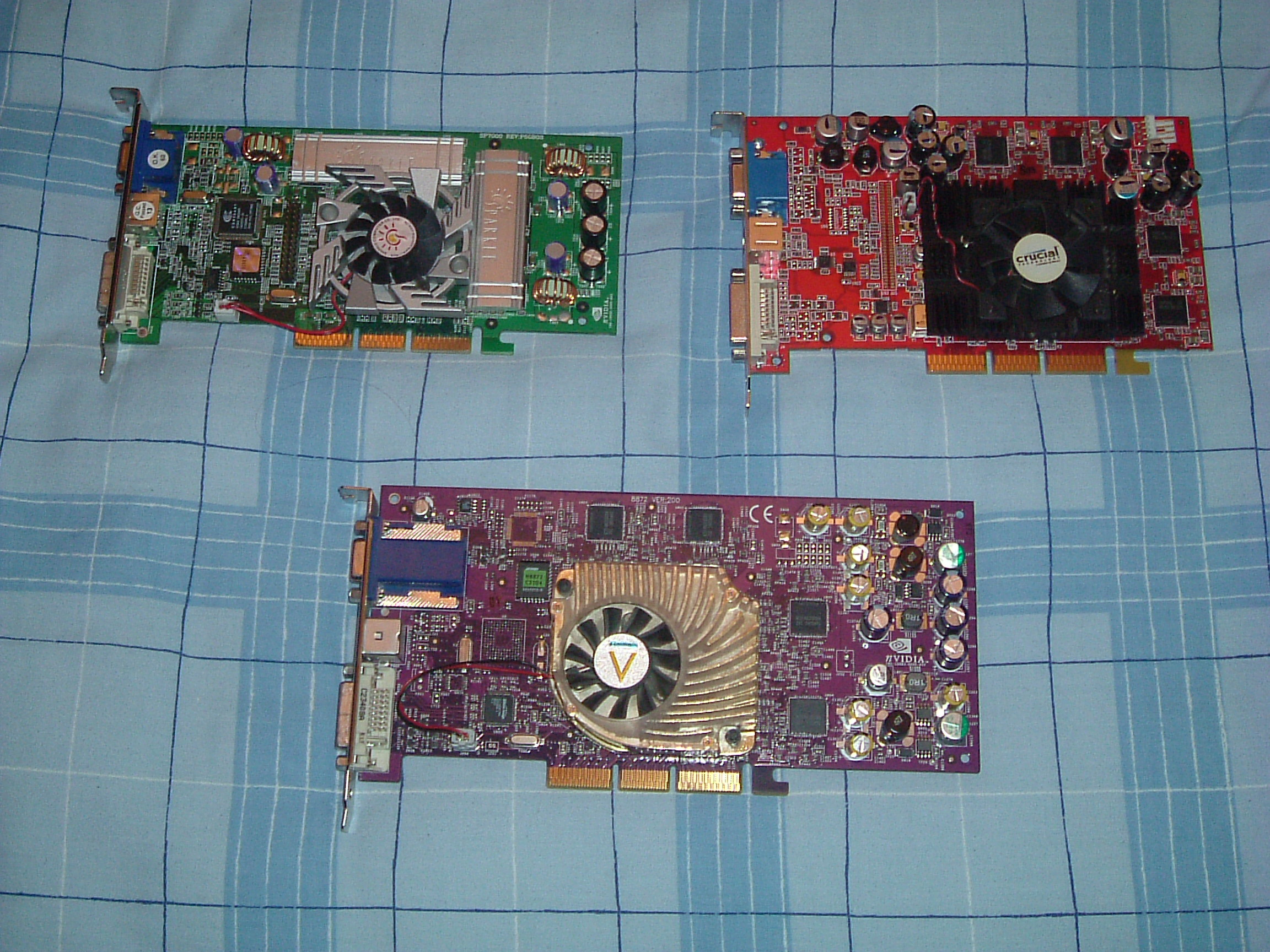 Geforce 3, ATI 9700 Pro and a Geforce 4.JPG