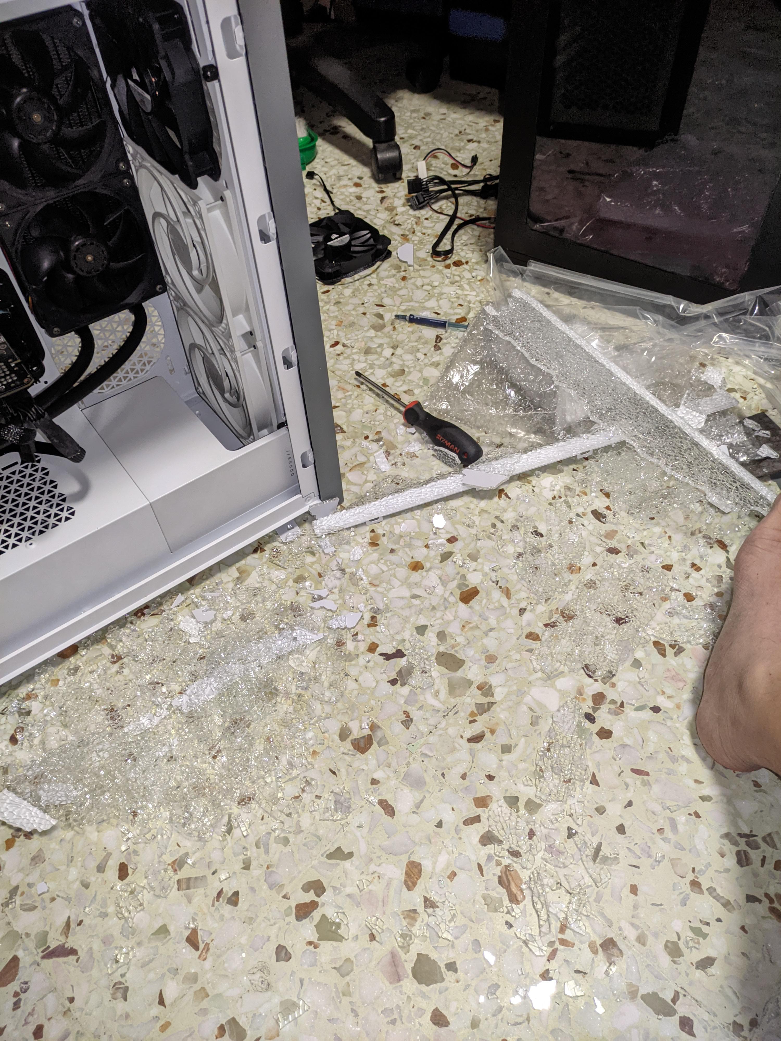 r/hardwaregore - a broken computer on the floor